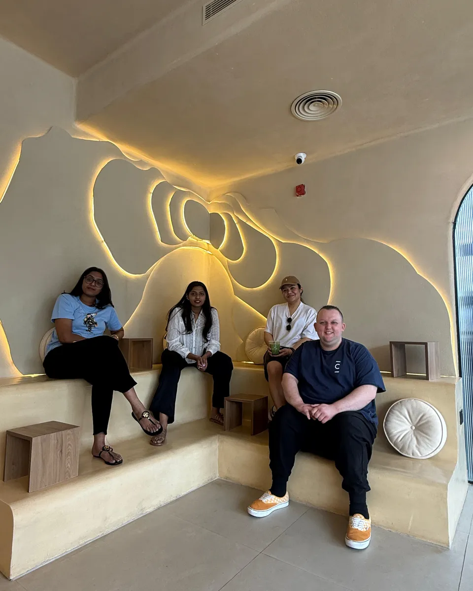 Friends relaxing in the lounge at CUPP Hyderabad